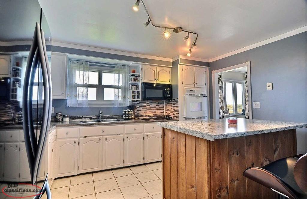 This beautiful 3 bedroom home needs nothing! Flower's Cove