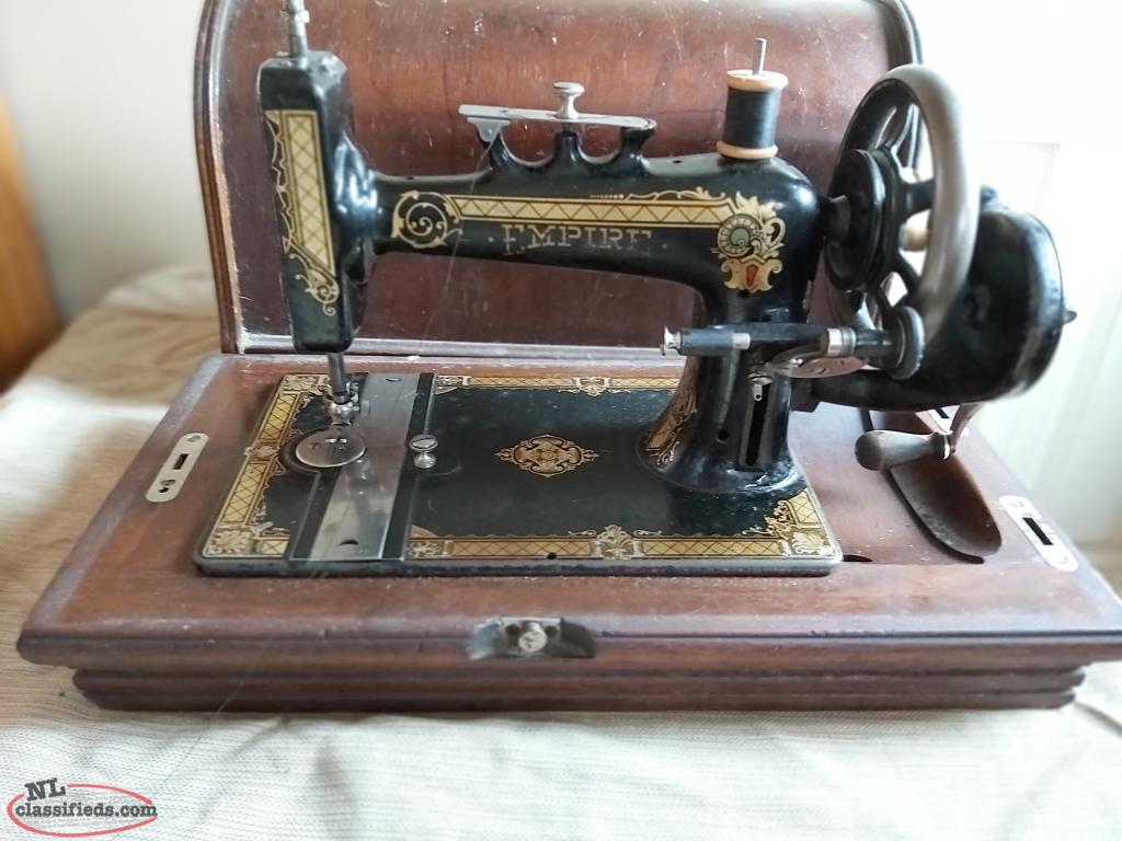 Antique " EMPIRE " sewing machine in case St.john's, Newfoundland