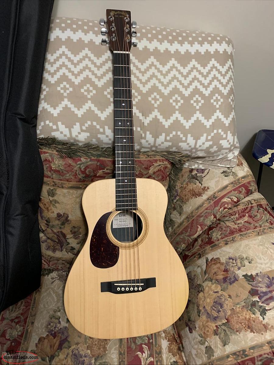 Martin mini lefty acoustic/electric guitar with case Clarenville