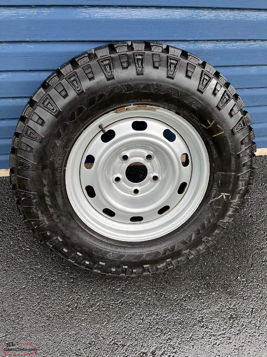 Goodyear Wrangler Duratrac studded winter tires and steel rims 265 / 70